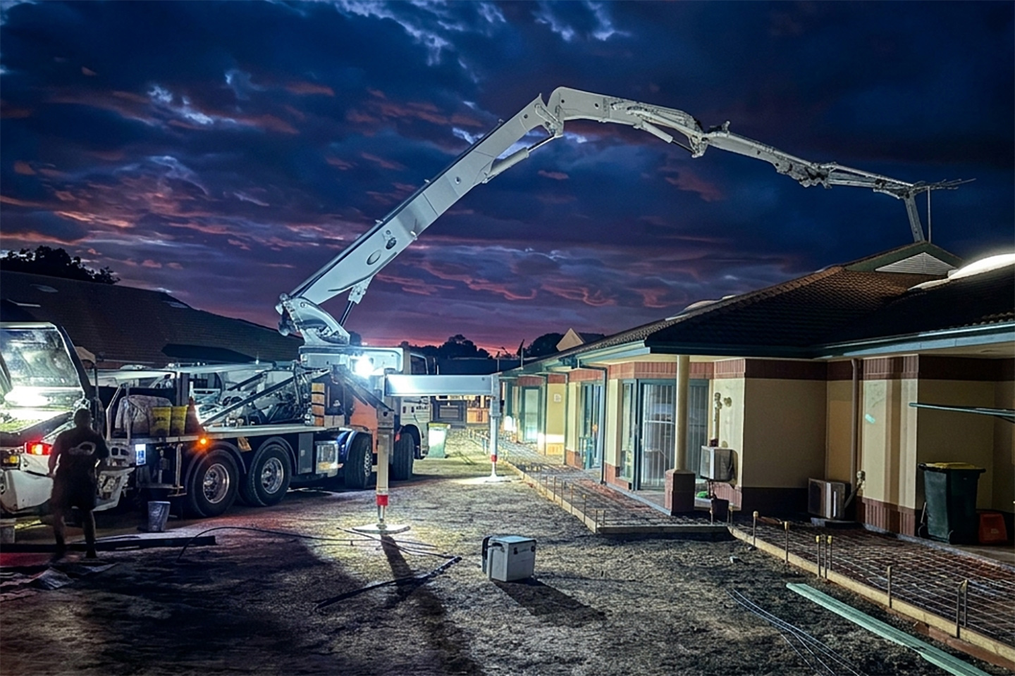 Concrete pour at night using boom pump, commercial project Adelaide